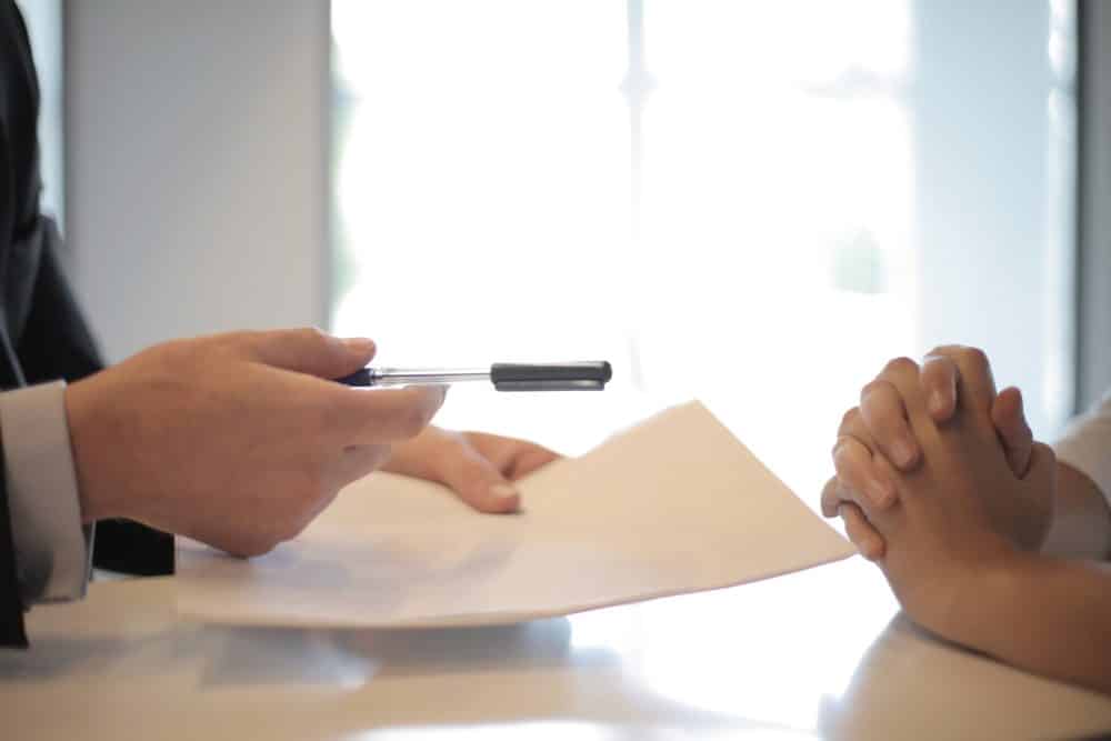Employer conducting a thorough background check on potential employee.