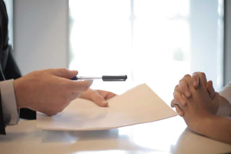 Employer conducting a thorough background check on potential employee.