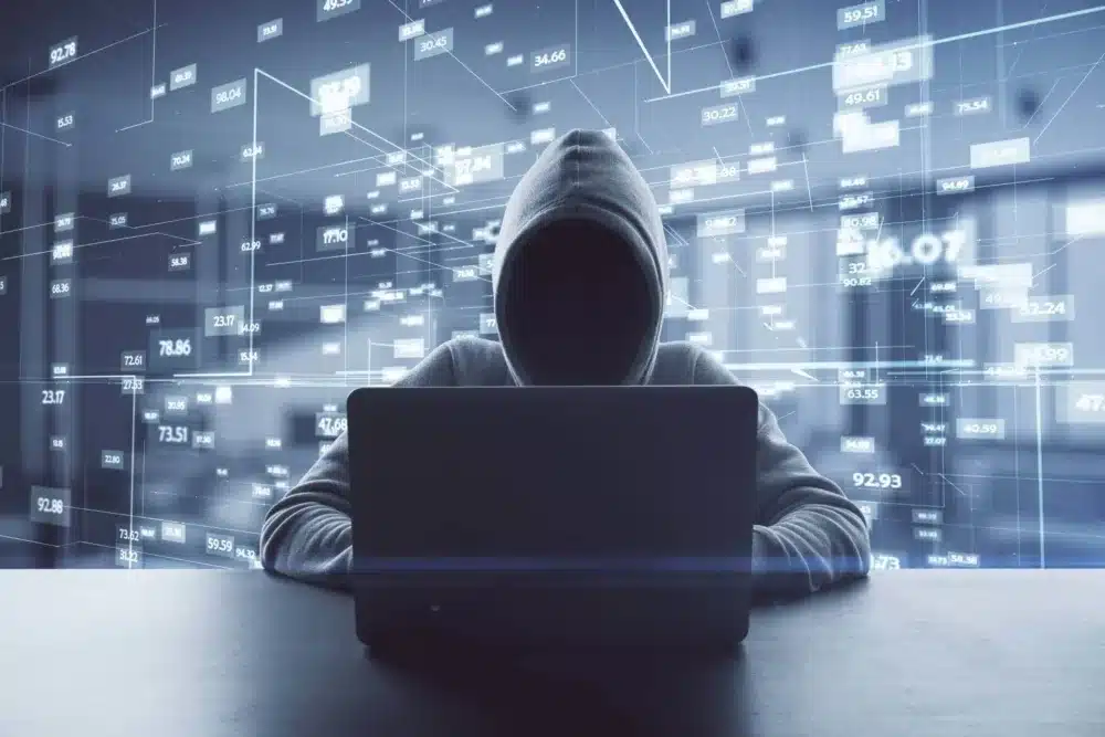 Silhouette of a person in a hooded sweatshirt, representing a cyberstalker.